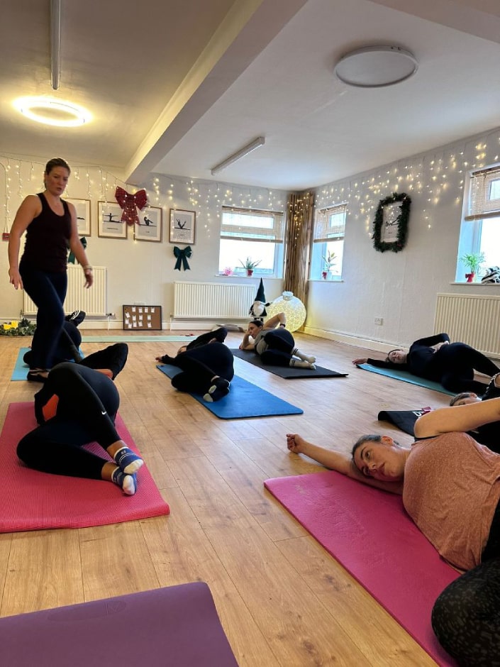 picture of Sarah, smiling at studio, SR Pilates UK, based in Horsforth, Leeds, West Yorkshire